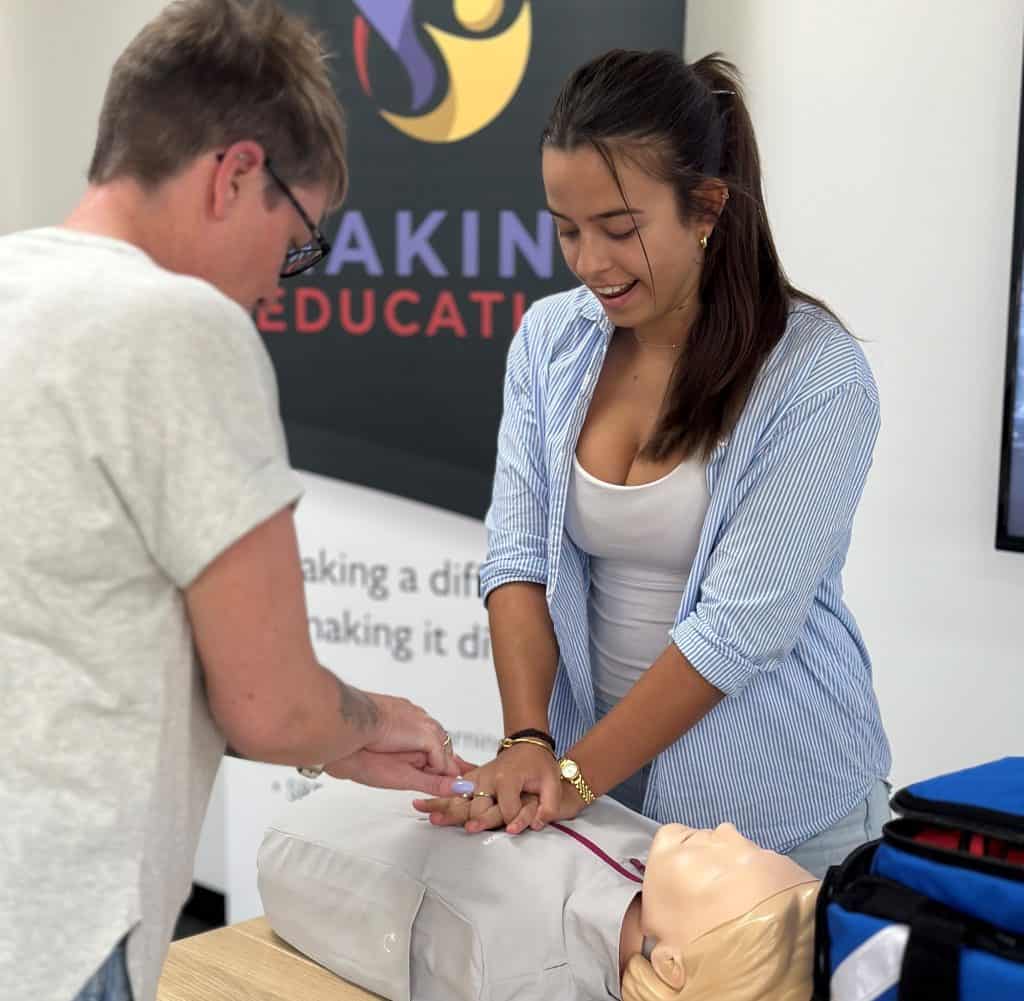 Student learning CPR at Making Education Childcare Training Course